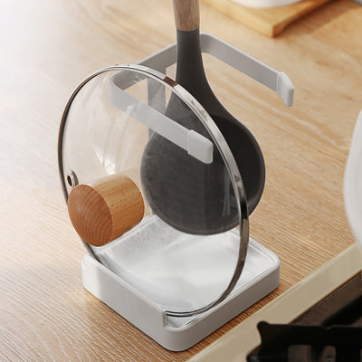 A stand for holding the lid of a pot