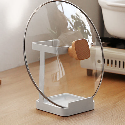 A stand for holding the lid of a pot